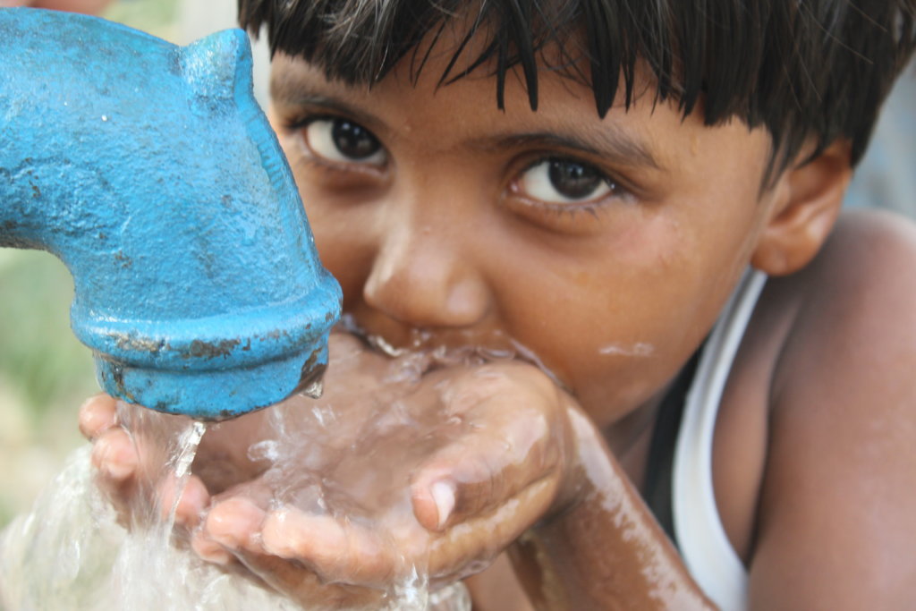 Volunteers distributing water